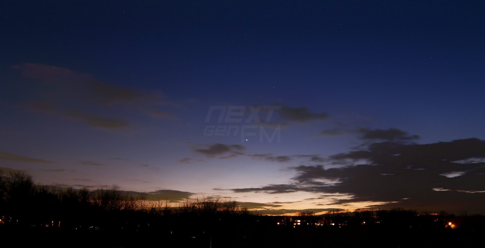 This image was captured one day later on December 22, the planets moving farther apart now with a little less cloud cover.